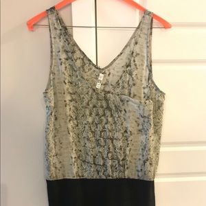 Beautiful leopard print top and black bottom dress